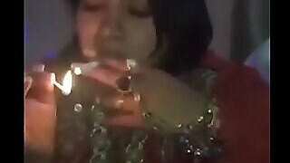 Indian problem drinker woman disparaging cliff masher close by smoking smoking